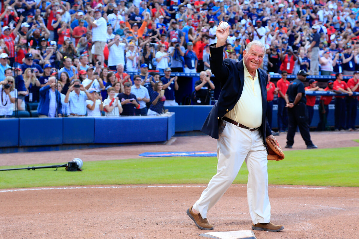 Hall of Famer Bobby Cox catches the ceremonial last pitch at Turner Field thrown by Hank Aaron after the game between the Atlanta Braves and the Detroit Tigers at Turner Field in Atlanta, Ga., on Oct. 2, 2016. (Daniel Shirey/Getty Images)