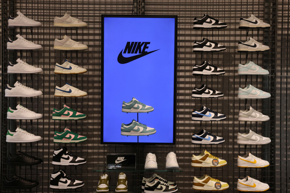 Nike sneakers on display at a store in Westfield Stratford City, London, on July 30. (Mina Kim/Reuters)