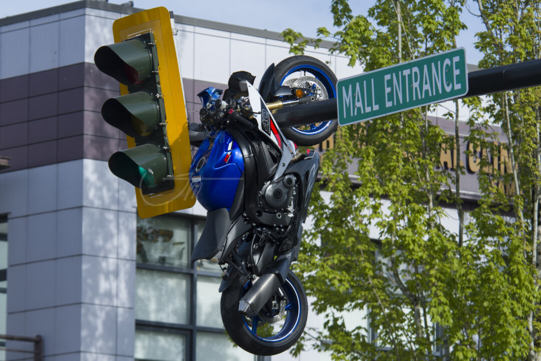 Cover image for Crash in Delta, BC, Leaves Motorcycle Hanging From Traffic Light