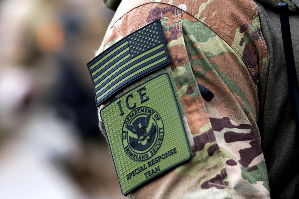 A member of the Department of Homeland Security ICE Special Response Team (SRT) displays a unit patch on their uniform during a protest at Immigration and Customs Enforcement (ICE) headquarters in Portland, Ore., on Oct. 4, 2025. (Carlos Barria/Reuters)