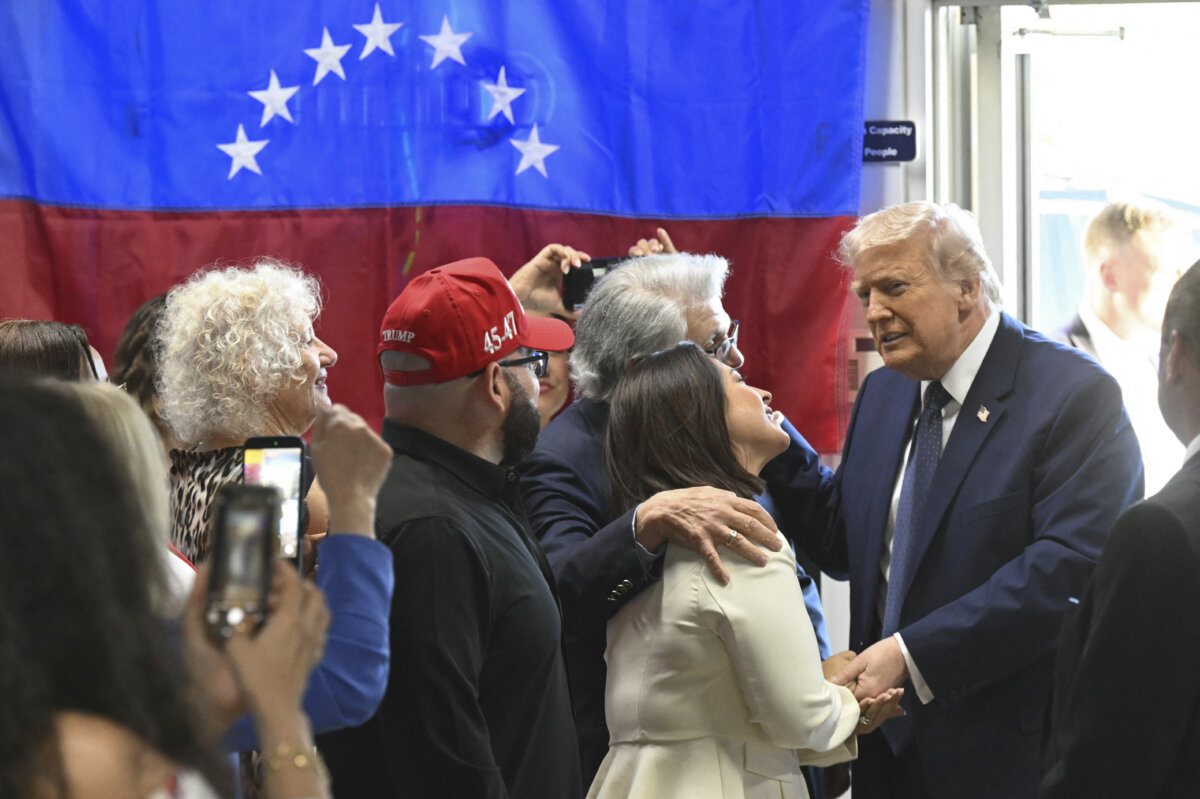 US President Donald Trump speaks with supporters at Venezuelan restaurant El Arepazo in Miami, Florida, March 9, 2026. (Photo by SAUL LOEB / AFP via Getty Images)