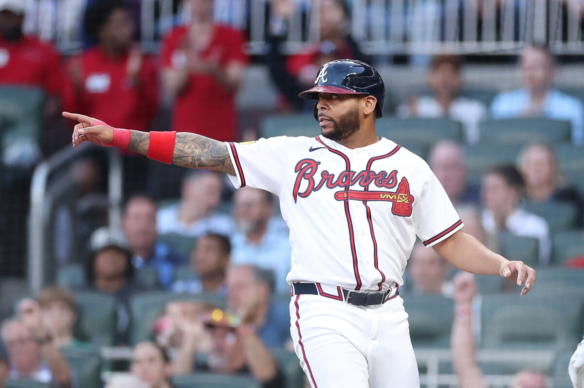 Dominic Smith #8 of the Atlanta Braves reacts after scoring on a RBI single by Mike Yastrzemski #18 in the third inning against the Chicago Cubs at Truist Park in Atlanta, on May 12, 2026. (Kevin C. Cox/Getty Images)
