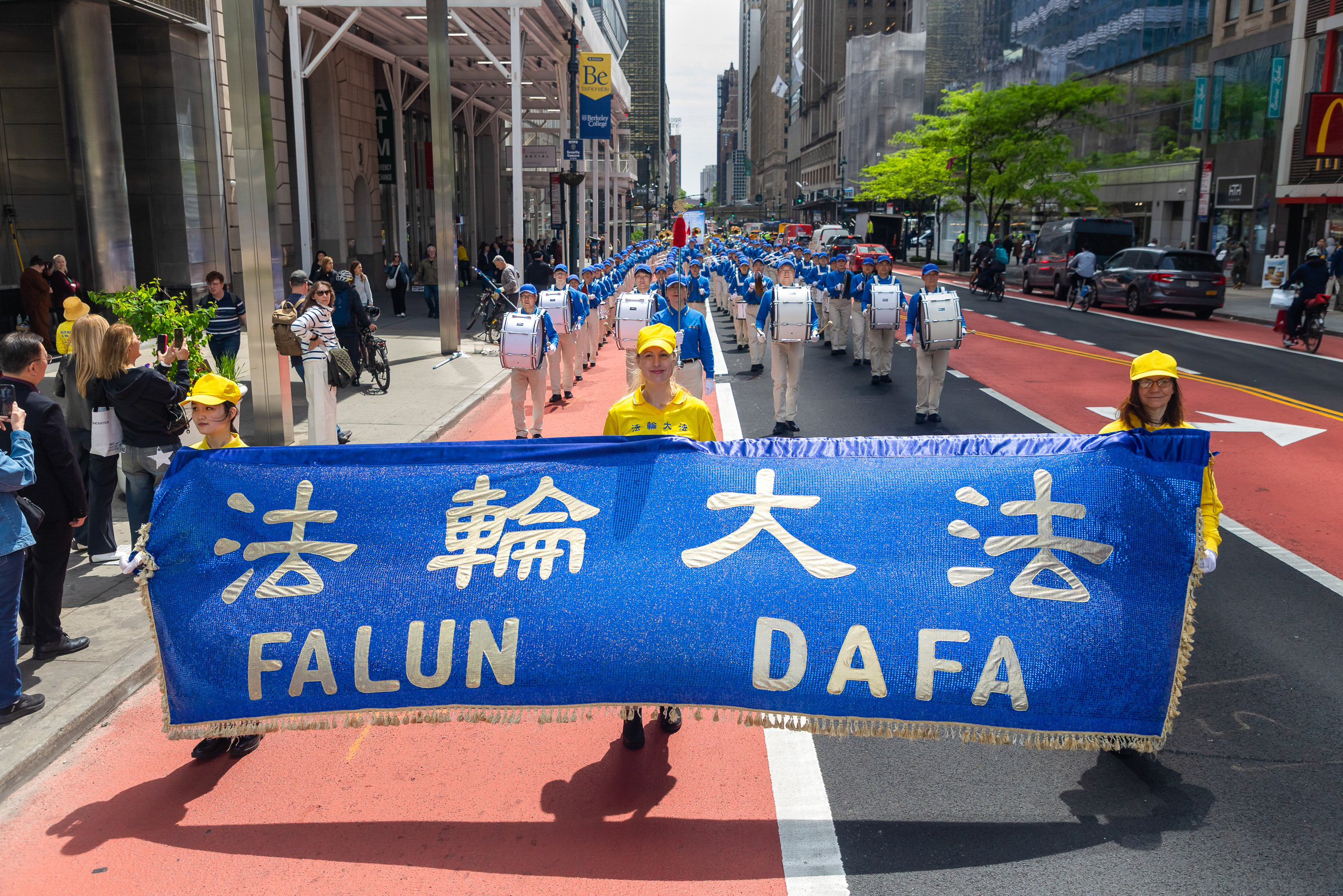 Day in Photos: Falun Dafa Day, Mayor Acting as Agent for China, and National Police Week