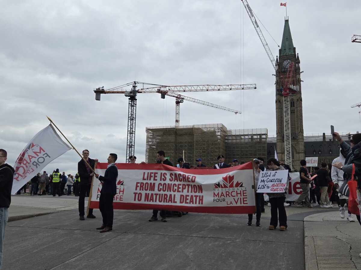 Pro-life supporters take part in the March for Life event in downtown Ottawa on May 14, 2026. The Epoch Times/Matthew Horwood