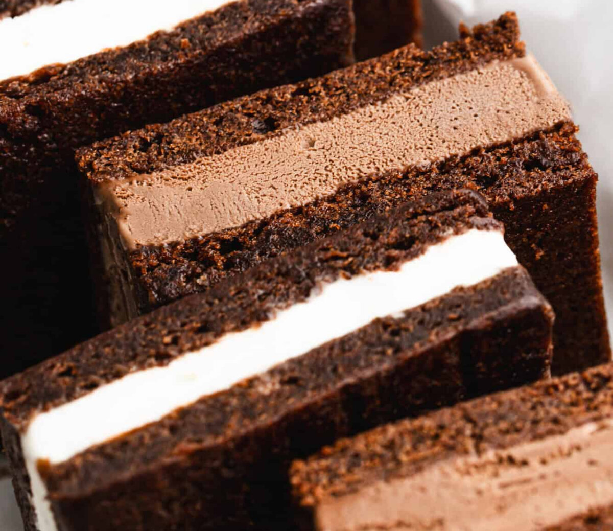 Homemade Ice Cream Sandwiches made with chewy chocolate sandwich layer and your favorite ice cream flavor inside. They're easy to make, fun to customize, and perfect for storing in the freezer all season long. (Lauren Allen)