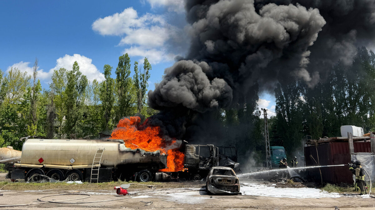 Ukrainian rescuers work to extinguish a fire after an air attack on an industrial facility in Zaporizhzhia, Ukraine, on May 15, 2026. (Darya Nazarova/AFP via Getty Images)
