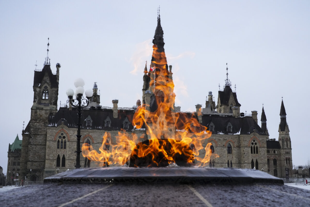 The Centennial Flame burns in front of the West Block on Parliament Hill in Ottawa on Jan. 8, 2025. The flame was first lit in January 1967 to mark the 100th anniversary of Canadian Confederation. (The Canadian Press/Sean Kilpatrick)