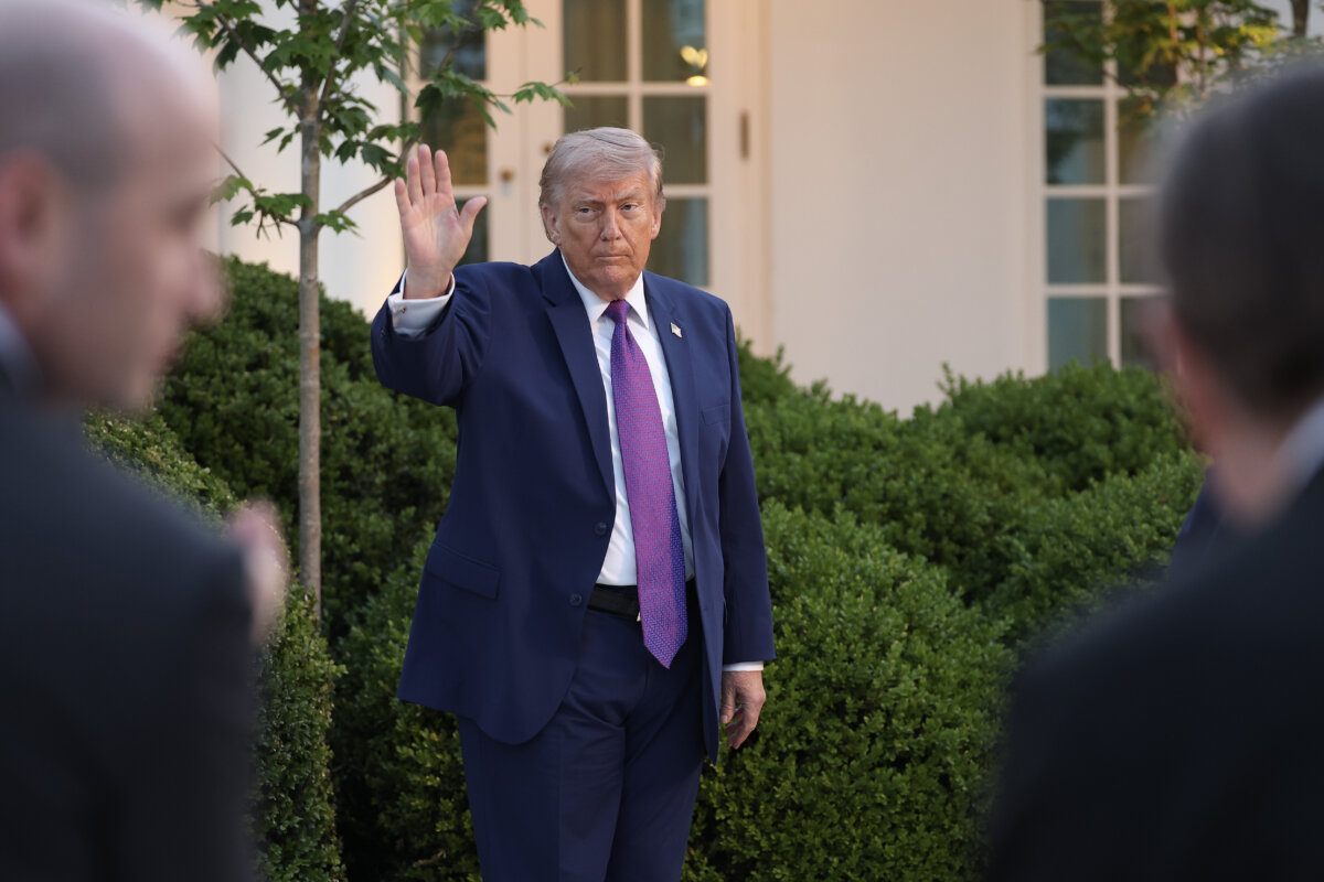 U.S. President Donald Trump waves after delivering remarks at a dinner for National Police Week in the Rose Garden at the White House on May 11, 2026. (Kevin Dietsch/Getty Images)