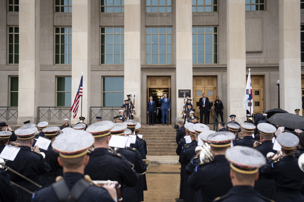 Secretary of War Pete Hegseth hosts an enhanced honor cordon and meeting welcoming South Korean Minister of National Defense Ahn Gyu-Back to the Pentagon in Arlington, Va., on May 11, 2026. (Madalina Kilroy/The Epoch Times)