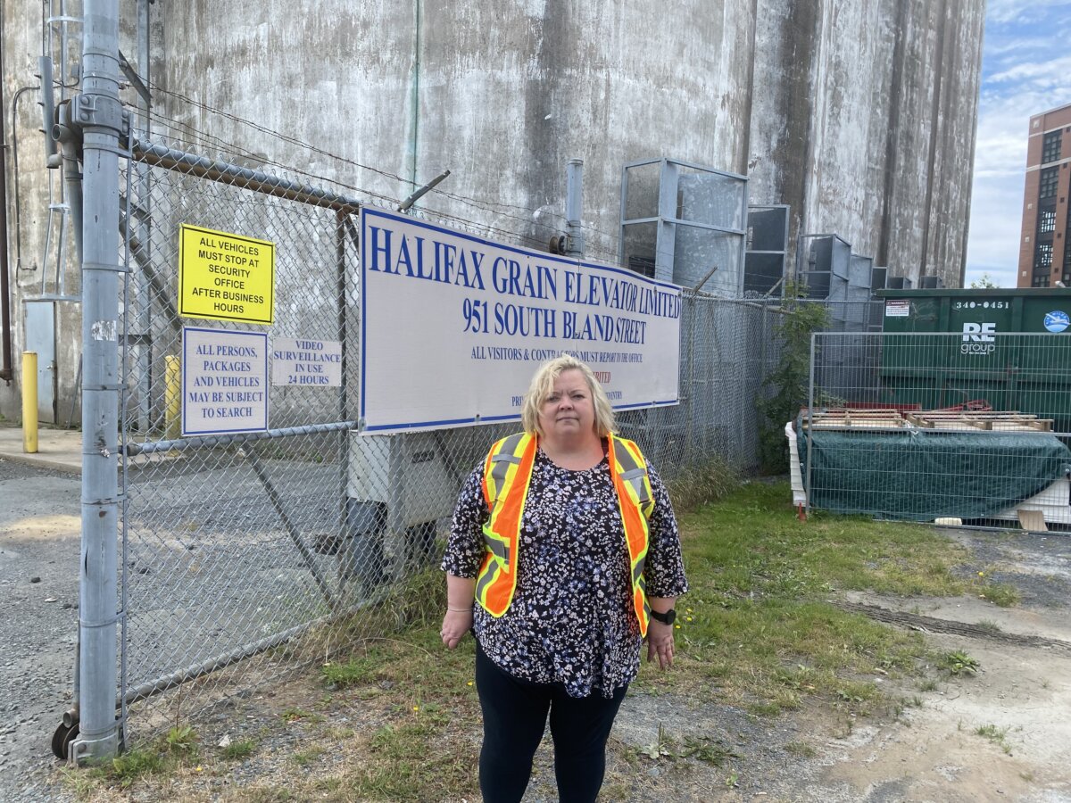 Kim Batherson, general manager of Halifax Grain Elevator Limited, shown outside the facility at the Port of Halifax on Aug. 20, 2025. (The Canadian Press/Keith Doucette)