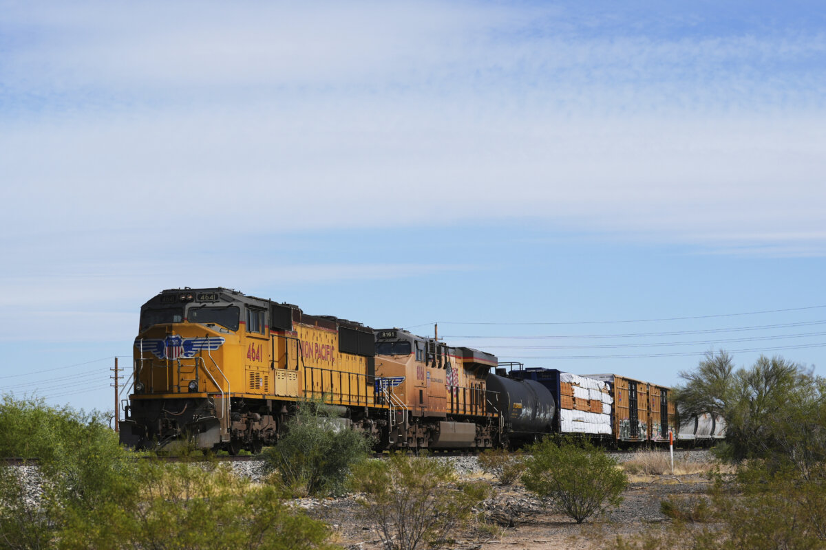A Union Pacific freight train travels along the tracks, on April 17, 2025, in Eloy, Ariz. (AP Photo/Ross D. Franklin)