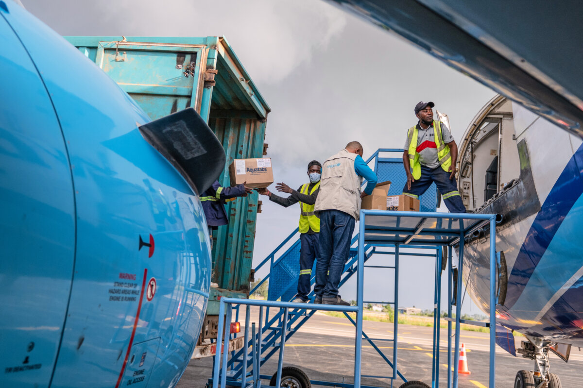 People off-load a shipment of more than 15 tons of supplies donated by UNICEF as part of the response to the Ebola virus outbreak at Bunia National Airport in Bunia, Congo, on May 19, 2026. (AP Photo/Moses Sawasawa)