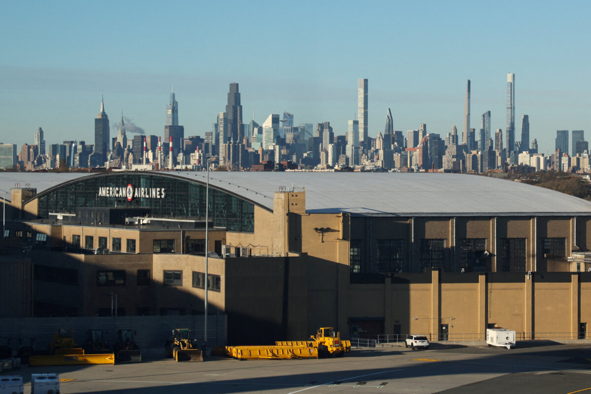 The Manhattan skyline behind the American Airlines hangar at the LaGuardia Airport in New York City on Nov. 18, 2025. (Kylie Cooper/Reuters)