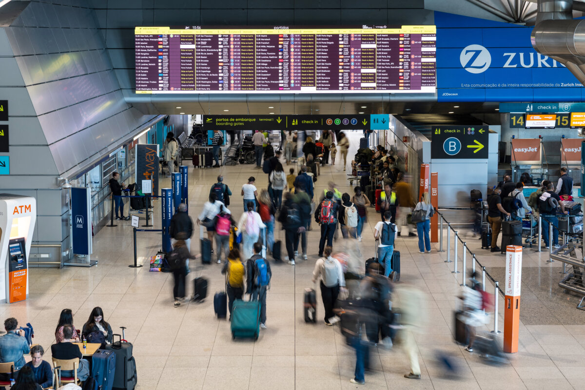 Strong demand for summer vacations continues to push airfare prices higher, even as travelers face rising fees and more expensive booking options. (Henrique Casinhas/AFP/Getty Images/TNS)