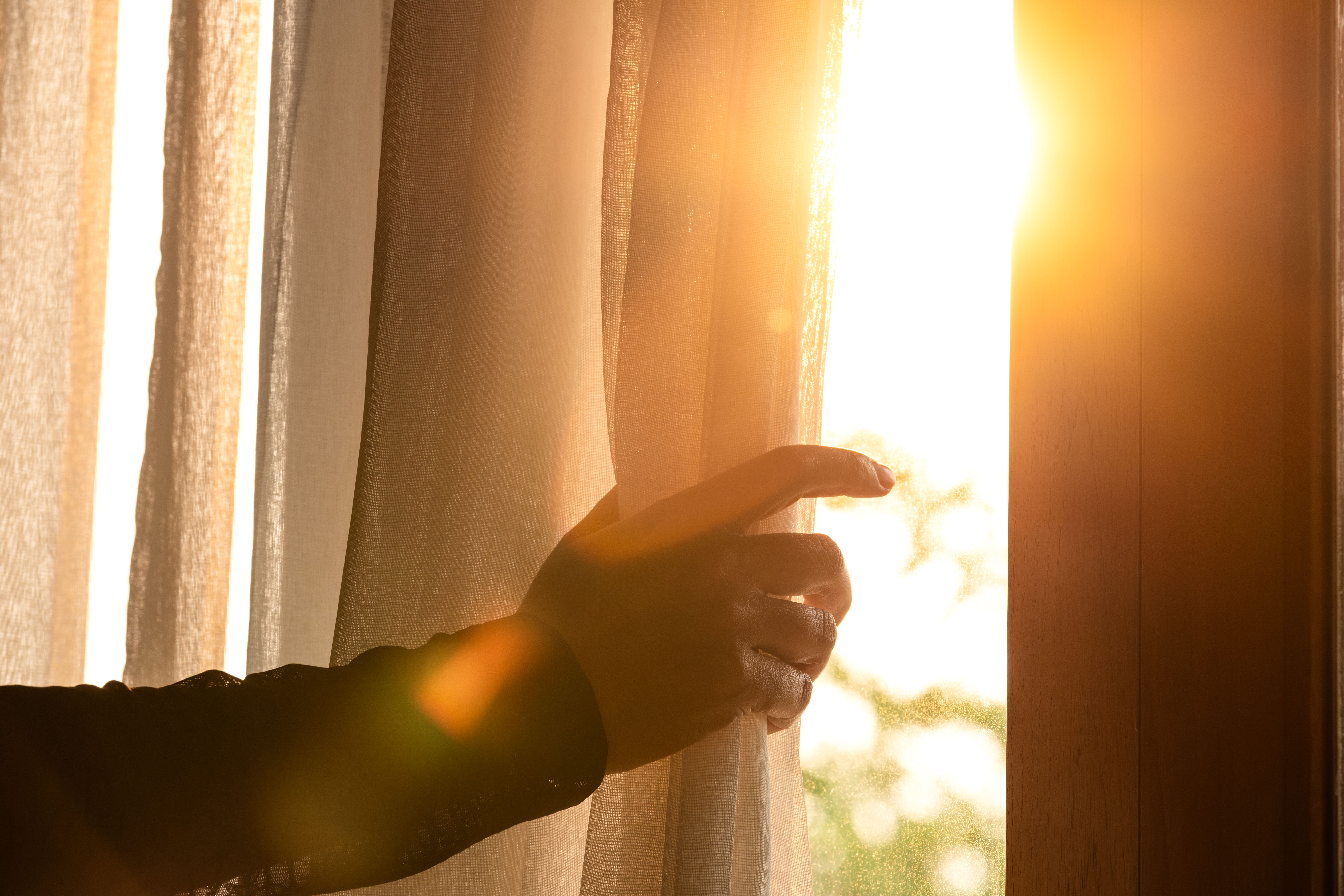 Woman's,Hand,She,Opened,The,Curtains,On,The,Window.,There