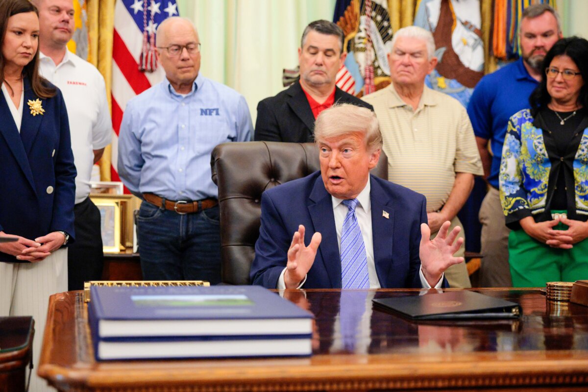 President Donald Trump is joined by grocery chain owners and politicians as he speaks in the Oval Office on May 21, 2026. (Chip Somodevilla/Getty Images)