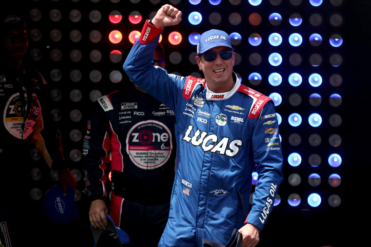 Kyle Busch, driver of the #8 Lucas Oil Chevrolet, walks onstage during driver intros prior to the NASCAR Cup Series All-Star Race at Dover Motor Speedway in Dover, Del., on May 17, 2026. (Meg Oliphant/Getty Images)