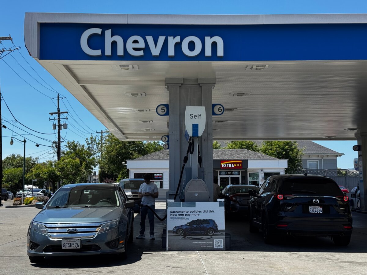 A sign blaming Sacramento policies for high gas prices is displayed at a Chevron gas station in Alameda, Calif., on May 21, 2026. (Terry Chea/AP Photo)