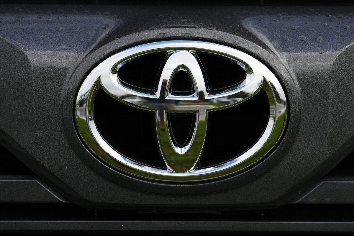 A Toyota vehicle logo is seen on a car at an automotive dealership in Ottawa on Aug. 11, 2023. (The Canadian Press/Sean Kilpatrick)