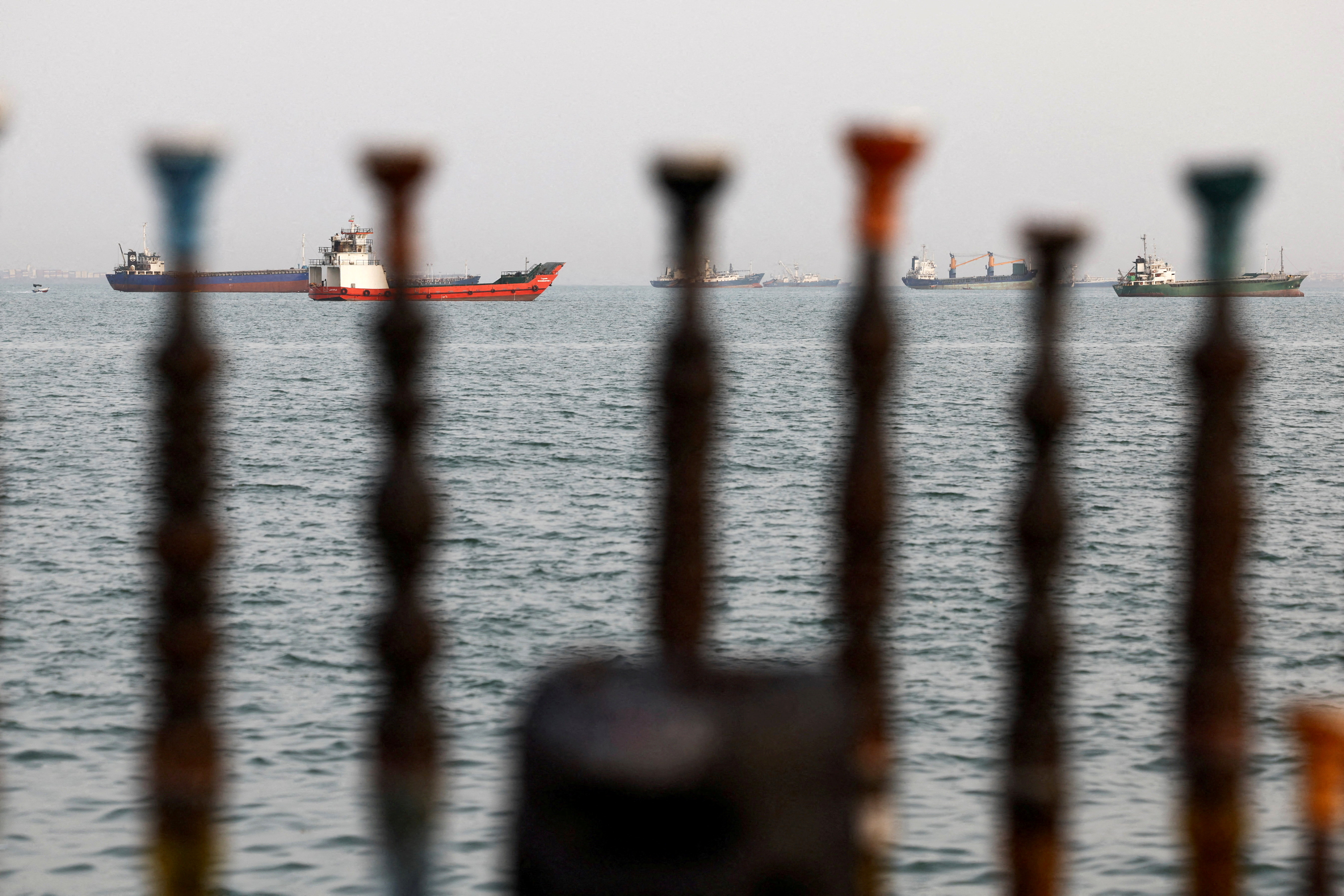 Vessels in the Strait of Hormuz are visible near the beach of Bandar Abbas