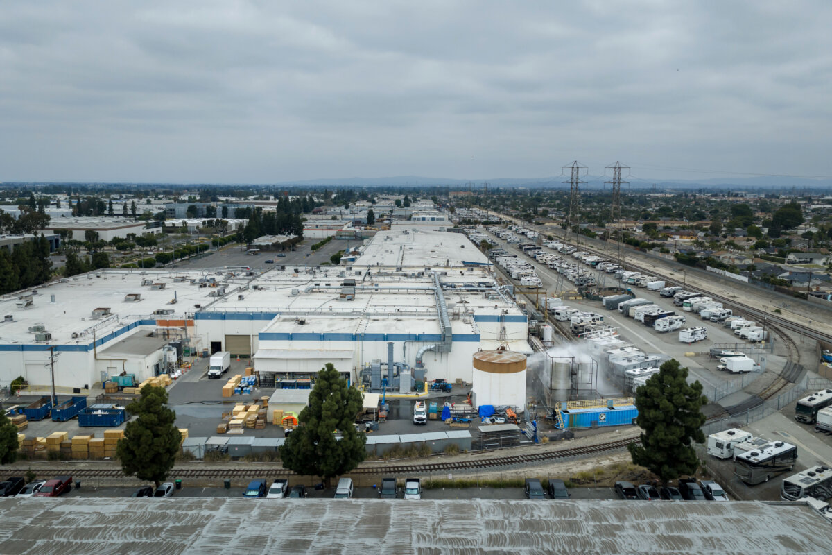 Water is sprayed on a damaged tank at GKN Aerospace after the tank containing a chemical used to make plastic parts overheated, in Garden Grove, Calif., on May 24, 2026. (AP Photo/Ethan Swope)