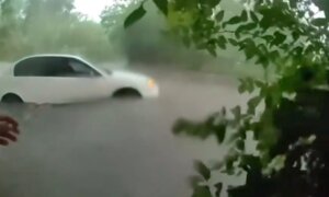 Officer Saves Baby From Flooded Car