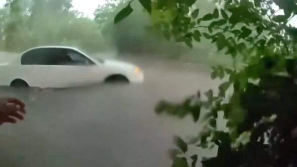 Officer Saves Baby From Flooded Car