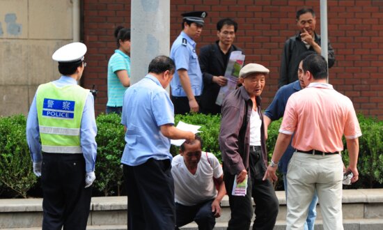 China Cuts 300,000 Enforcement Officers Amid Complaints of Abuse, Mounting Fiscal Stress
