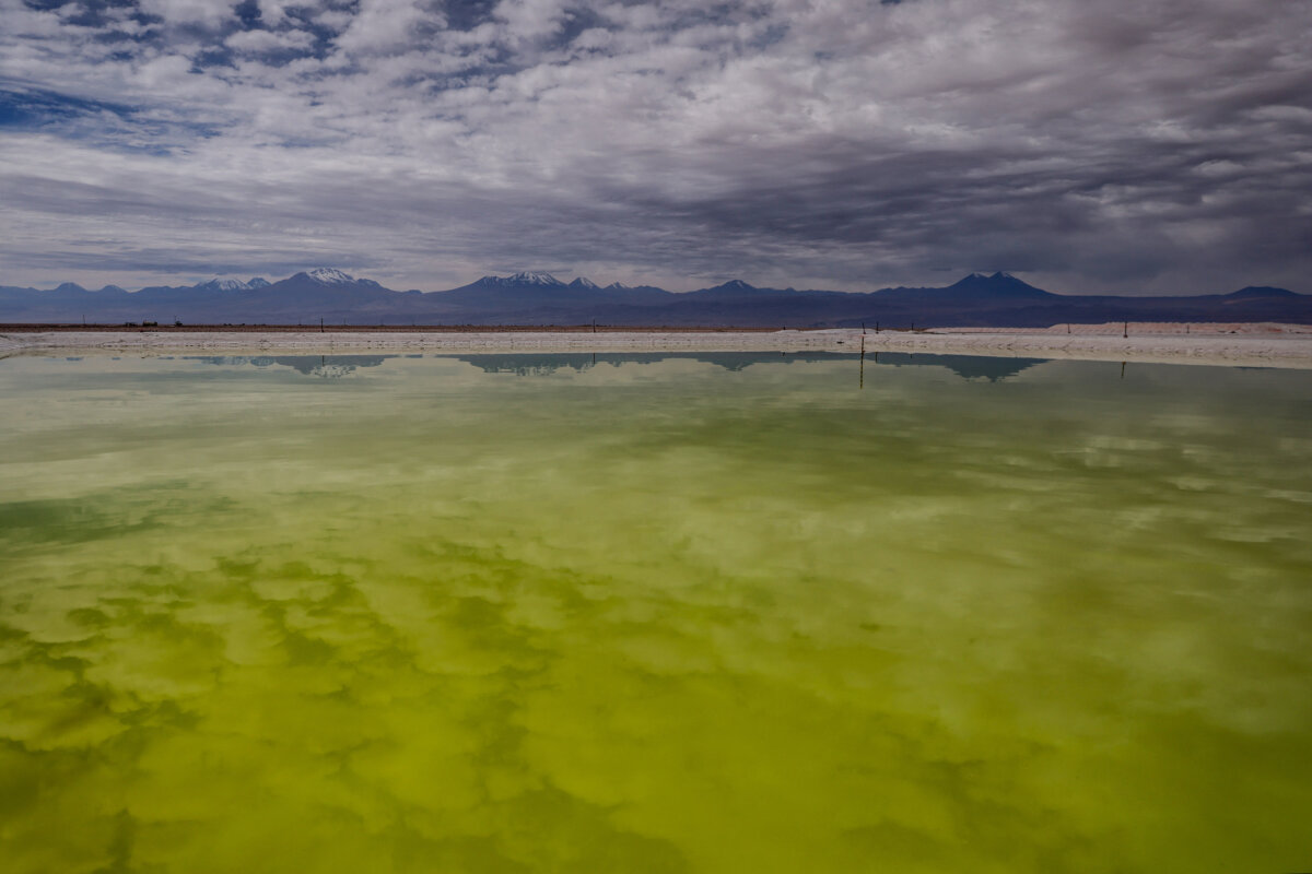 A brine pool reflects clouds at a lithium mine in the Atacama salt flat, close to San Pedro de Atacama area, Antofagasta region, Chile May 4, 2023. (REUTERS/Ivan Alvarado)