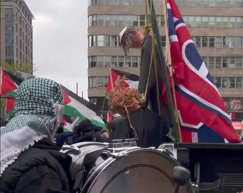 Anti-Israel protesters parade in Montreal in the week of May 24, 2025, with mock hangings displays. (Guillaume Roy/Rebel News/Screenshot via The Epoch Times)