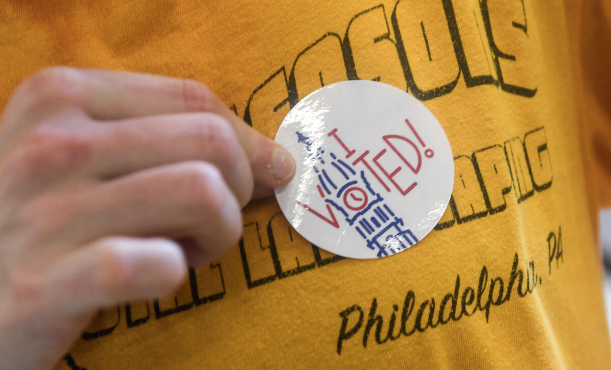 A voter shows off their sticker after casting their ballots in the Pennsylvania Primary Election, in Philadelphia, Pa., on May 19, 2026. (Matthew Hatcher/Getty Images)