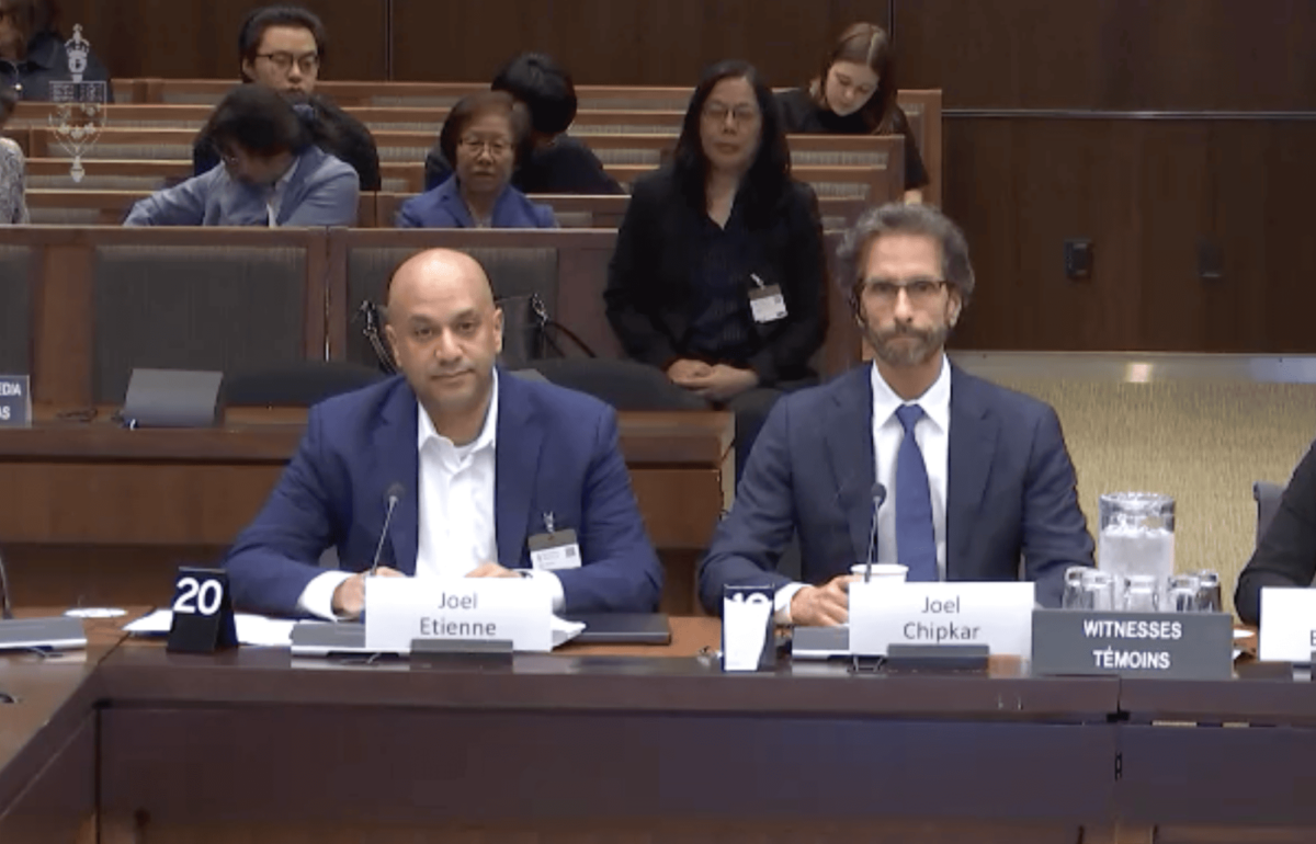Joel Chipkar (R), spokesperson for the Falun Dafa Association of Canada (FDAC), and Joel Etienne, legal adviser for the FDAC, testify before the House of Commons Standing Committee on Canadian Heritage on May 28, 2026. (House of Commons/Screenshot via The Epoch Times)