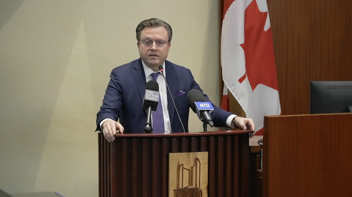 New York Times best-selling author and Epoch Times senior editor Jan Jekielek speaks at a book talk event for his new book "Killed to Order: China’s Organ Harvesting Industry and the True Nature of America’s Biggest Adversary,” at Toronto City Hall on May 27, 2026. (NTD)
