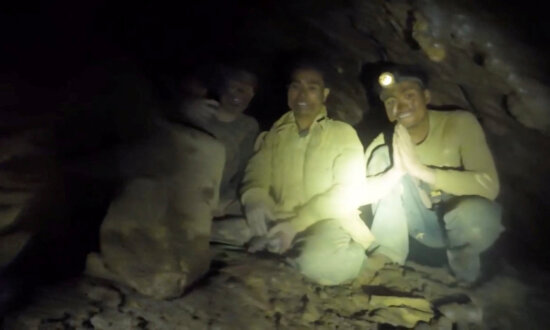 Rescuers Pull First Trapped Person From Flooded Laos Cave
