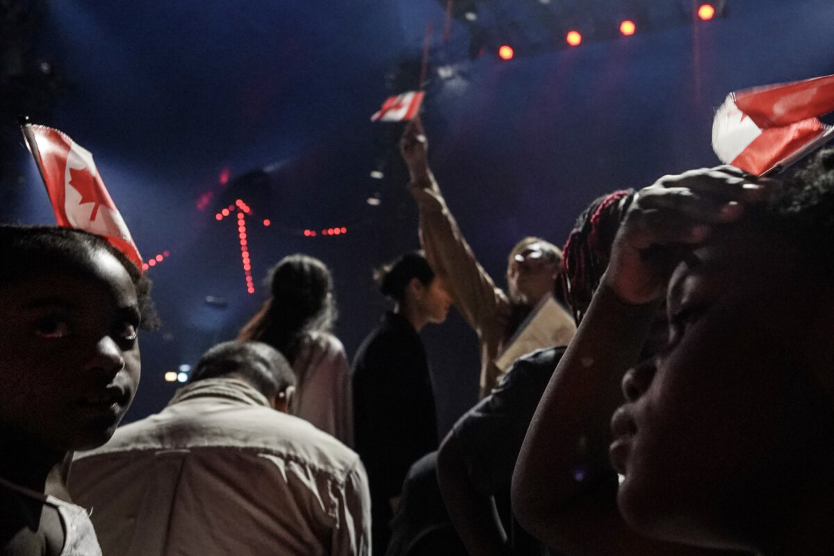 Nearly 400 new Canadians from 65 countries gather at a ceremony in Toronto to take an oath of citizenship on July 19, 2024. (The Canadian Press/Chris Young)