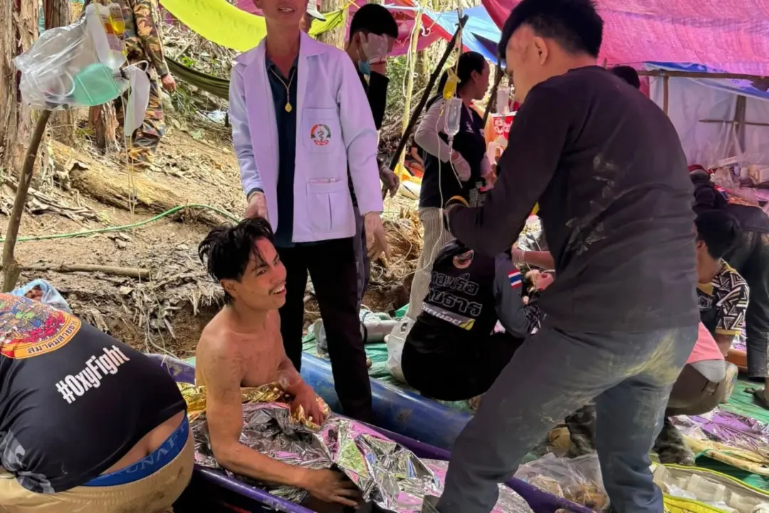 Cover image for Four Men Rescued From Flooded Cave in Laos