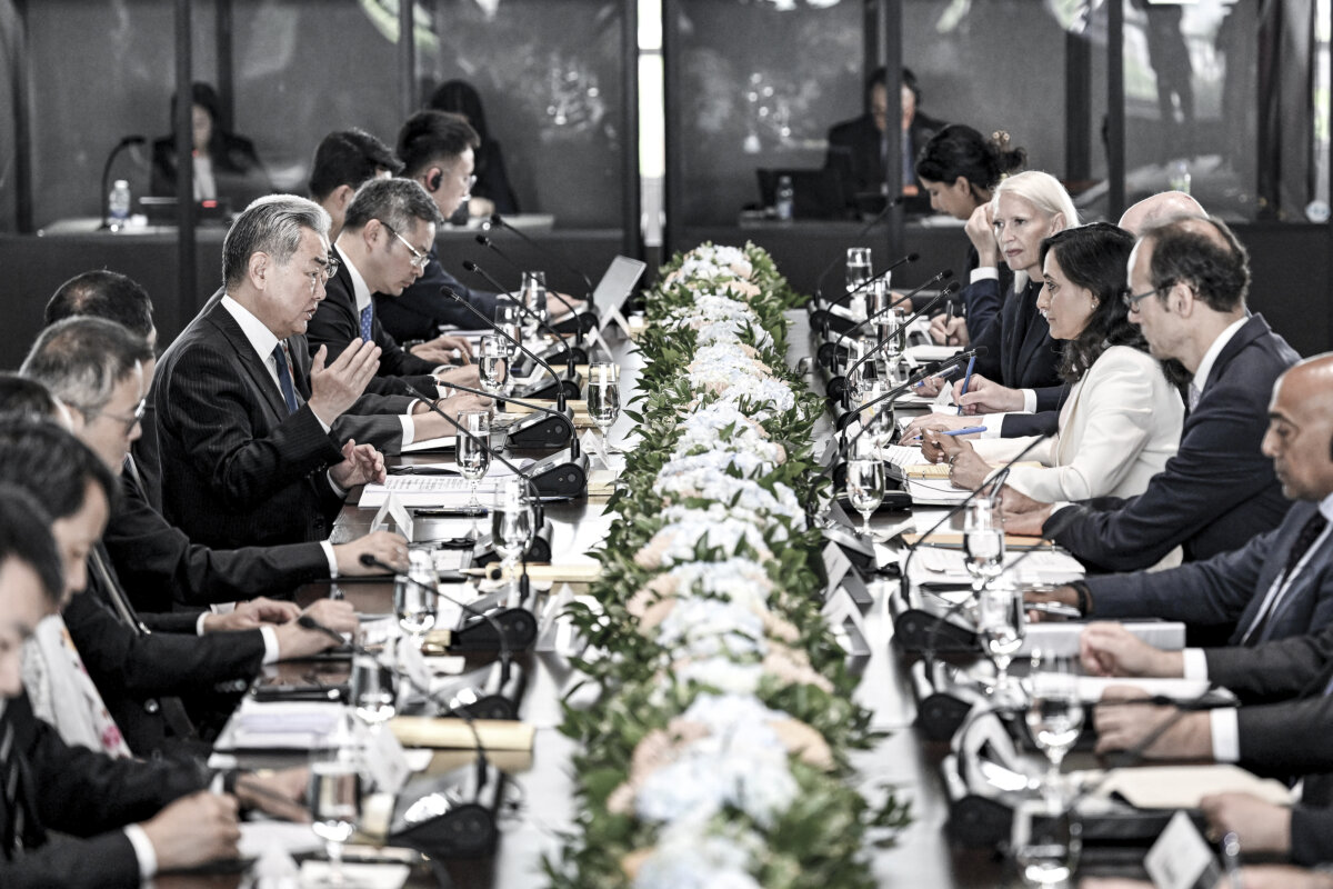 Minister of Foreign Affairs Anita Ananda (centre right), meets with the Foreign Minister of China Wang Yi at Global Affairs Canada in Ottawa, on May 29, 2026. (/Spencer Colby/The Canadian Press)