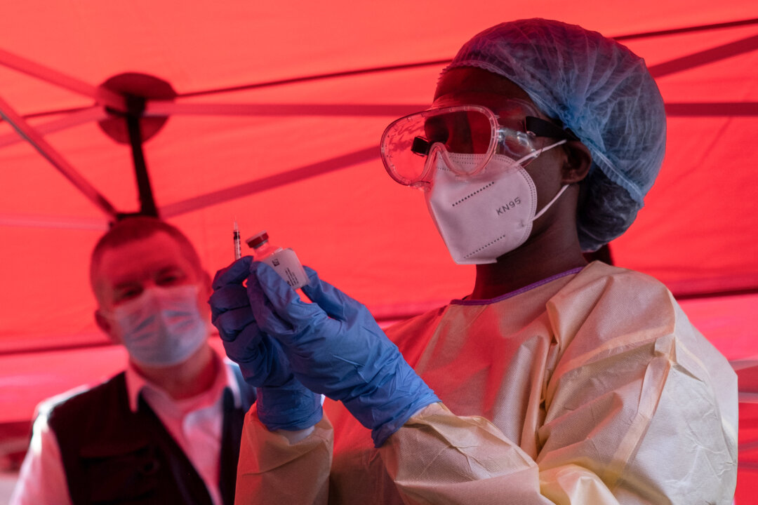 A nurse prepares a vaccine during an Ebola vaccine trial in Kampala, Uganda, on Feb. 3, 2025. (Badru Katumba/AFP via Getty Images)
