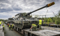 Day in Photos: Fighter Lion Tanks, Factory Explosion in Malta, and Children’s Safety Debate