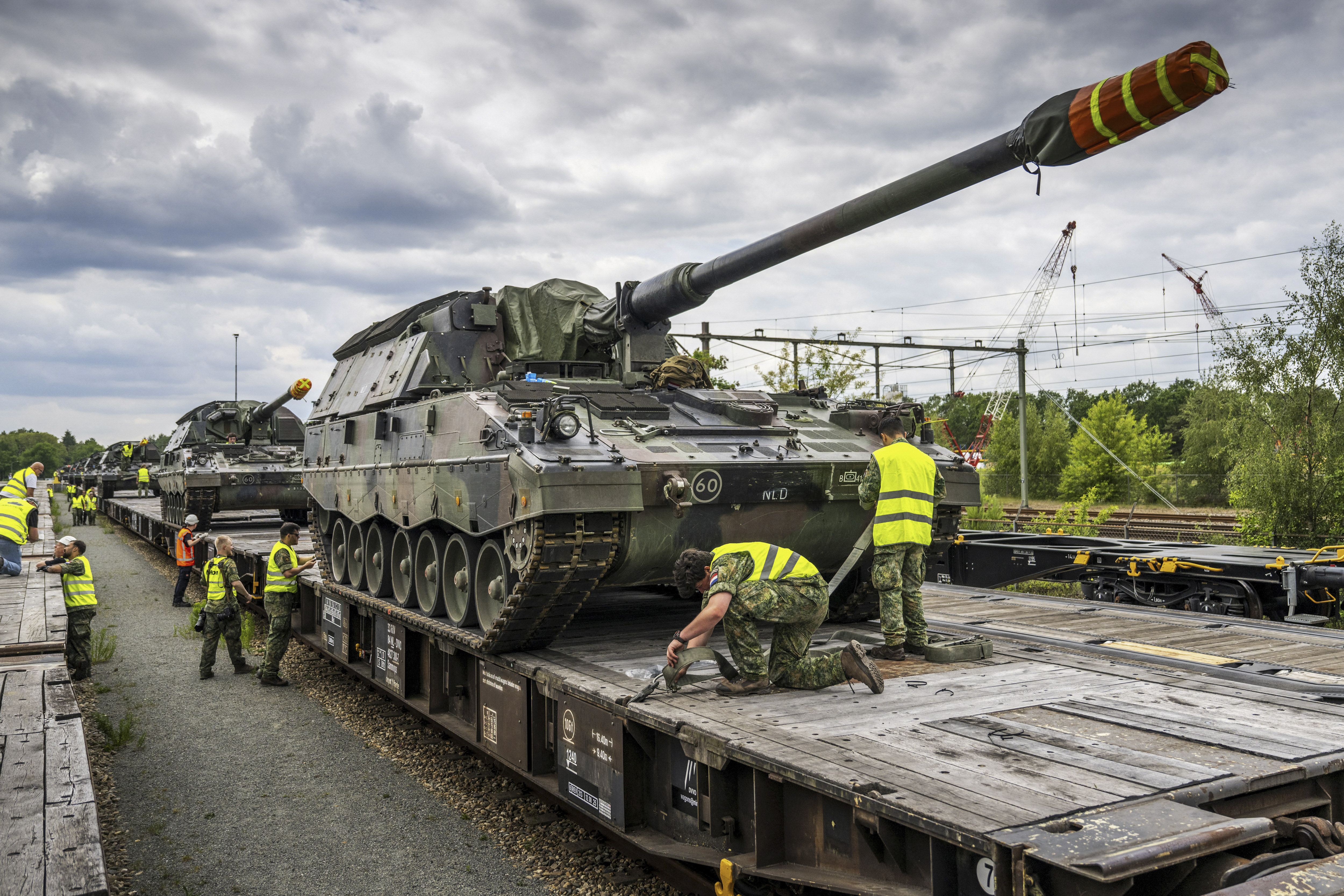 Day in Photos: Fighter Lion Tanks, Factory Explosion in Malta, and Children’s Safety Debate