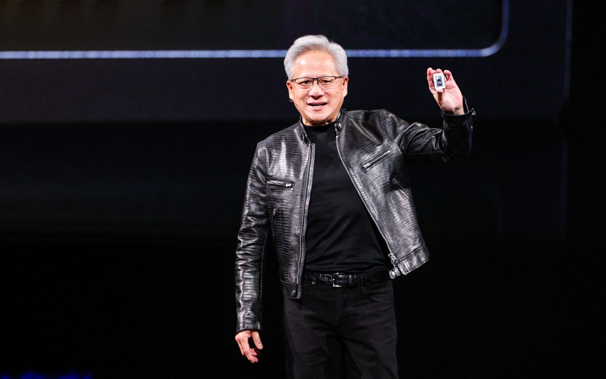 Nvidia CEO Jensen Huang introduces a new chip for Windows laptops during his keynote speech at Computex 2026 in Taipei on June 1, 2026. (I-Hwa Cheng / AFP via Getty Images)