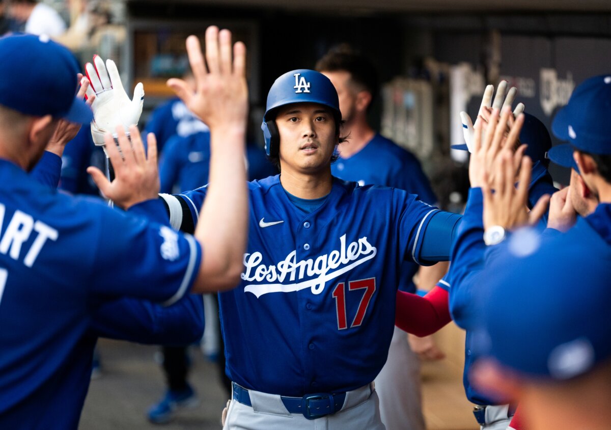 Shohei Ohtani #17 of the Los Angeles Dodgers celebrates after hitting a solo home run against the Minnesota Twins during the first inning of the game at Target Field in Minneapolis, Minn., on June 22, 2026. (Stephen Maturen/Getty Images)
