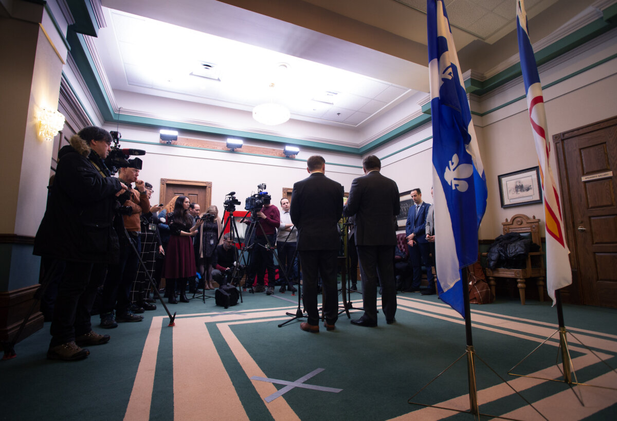 Former Quebec premier Francois Legault and former Newfoundland and Labrador premier Andrew Furey hold a joint news conference about Churchill Falls in St. John's on Feb. 24, 2023. (The Canadian Press/Paul Daly)