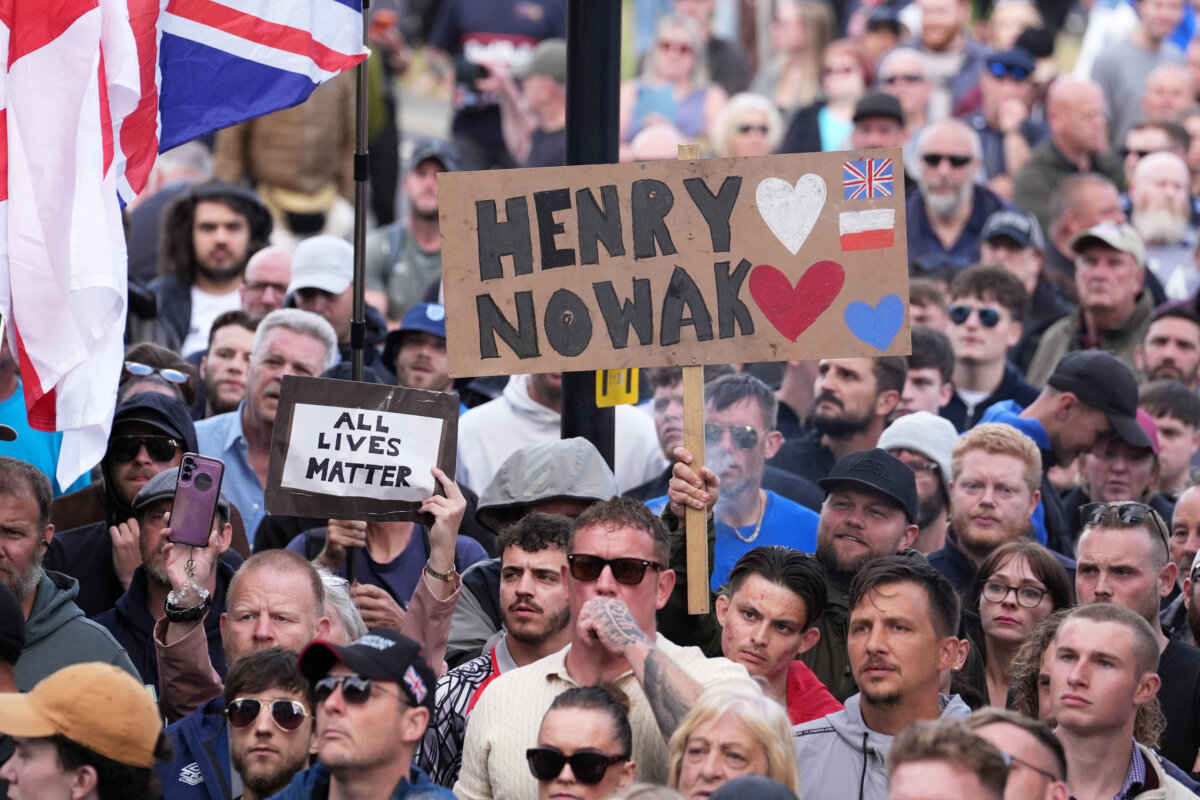People gather to protest outside Southampton police station in Southampton, England, on June 2, 2026. (Gareth Fuller/PA via AP)