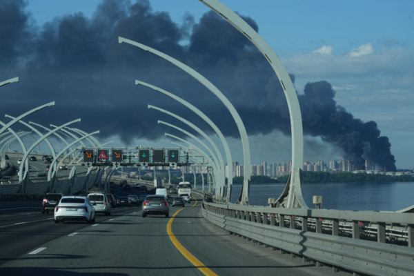 A plume of black smoke is seen after a Ukrainian drone attack over the port of St. Petersburg, Russia, on June 3, 2026. (AP Photo)