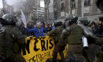 Day in Photos: Demonstration in Chile, Military Helicopter Crash, and Fire in India