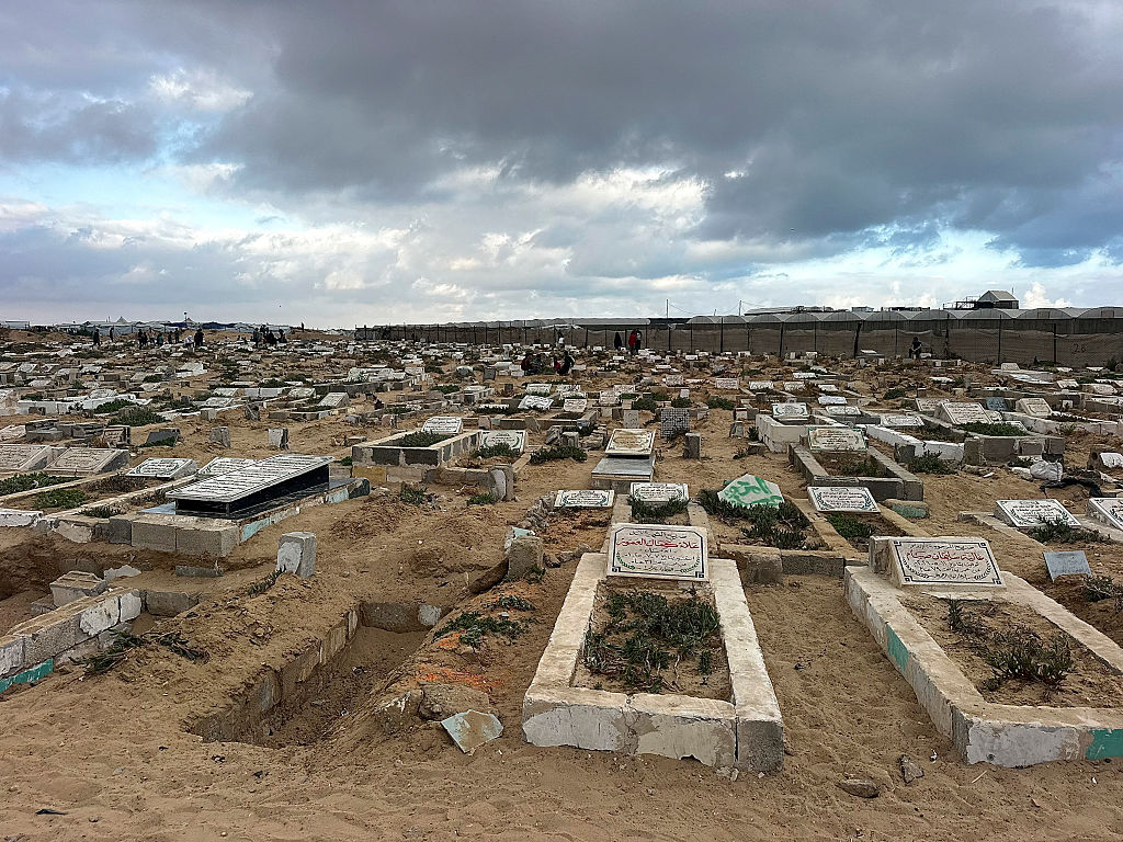 A view shows graves during Eid al-Adha at a cemetery in Khan Yunis, Gaza Strip, on May 27, 2026. (Doaa Albaz/Middle East Images/AFP via Getty Images)