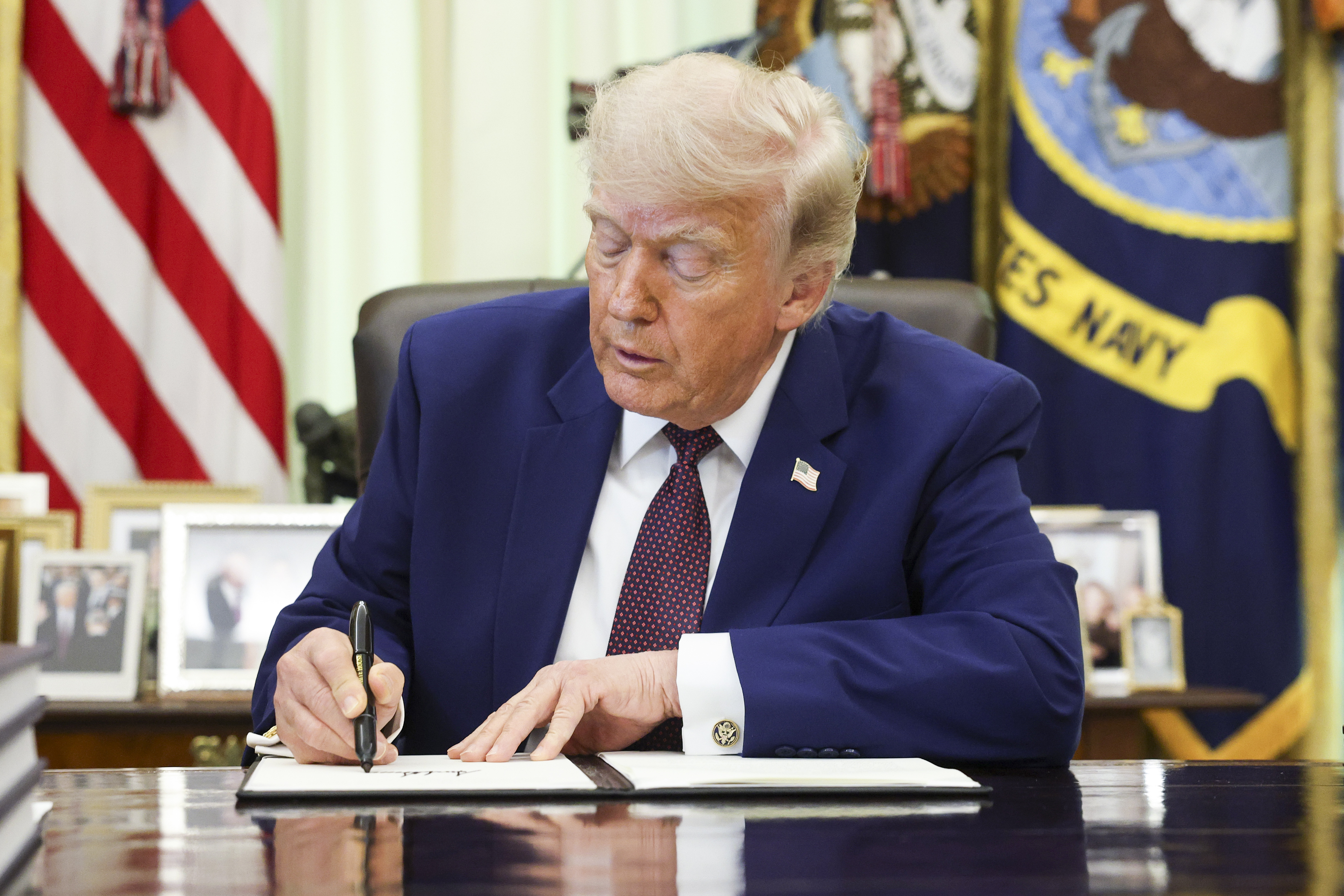 President Trump Signs Executive Orders In The Oval Office