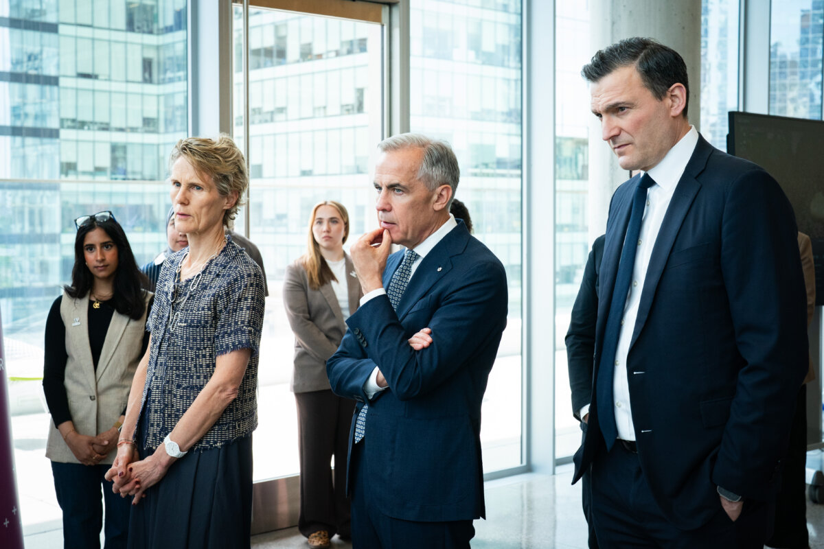 (L-R) Diana Fox Carney, Prime Minister Mark Carney, and Artificial Intelligence Minister Evan Solomon visit technology startups at the Vector Institute, in Toronto on June 4, 2026. (The Canadian Press/Arlyn McAdorey)