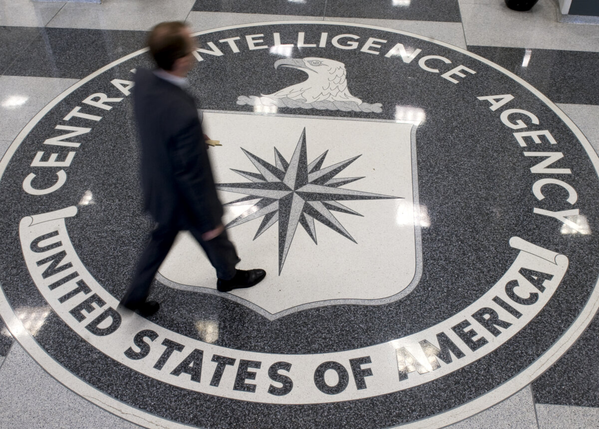 A man crosses the Central Intelligence Agency (CIA) seal in the lobby of CIA Headquarters in Langley, Virginia, on August 14, 2008. AFP PHOTO/SAUL LOEB (Photo by SAUL LOEB / AFP) (Photo by SAUL LOEB/AFP via Getty Images)
